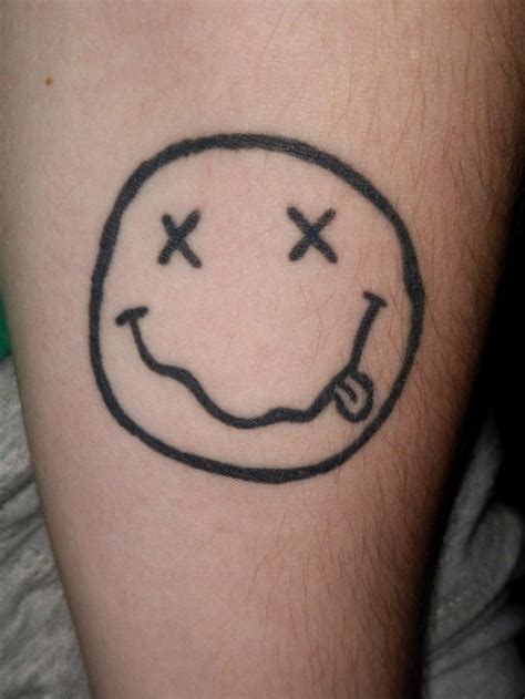 Nirvana Smiley Face Logo Tattoo