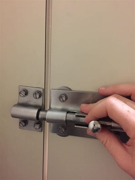 This INSANELY durable bathroom stall lock! : r/mildlyinteresting