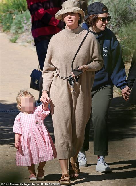 Katy Perry holds hands with daughter Daisy Dove, one, who WALKS as they ...