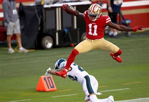 Video: 49ers' Brandon Aiyuk hurdles Eagles player for touchdown