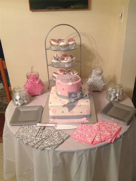 Candy cake & cupcakes. Baby girl baby shower. Cake topped with a tiara ...