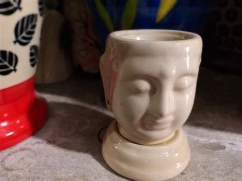 Ceramic Buddha Head Fragrance Oil Warmer Lamp, For Interior Decor at best price in Delhi