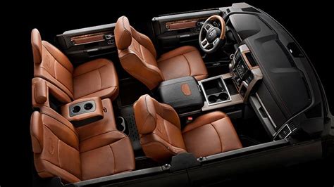 The 2014 Ram 1500 Laramie Longhorn® Crew Cab features an interior with premium leather seating ...