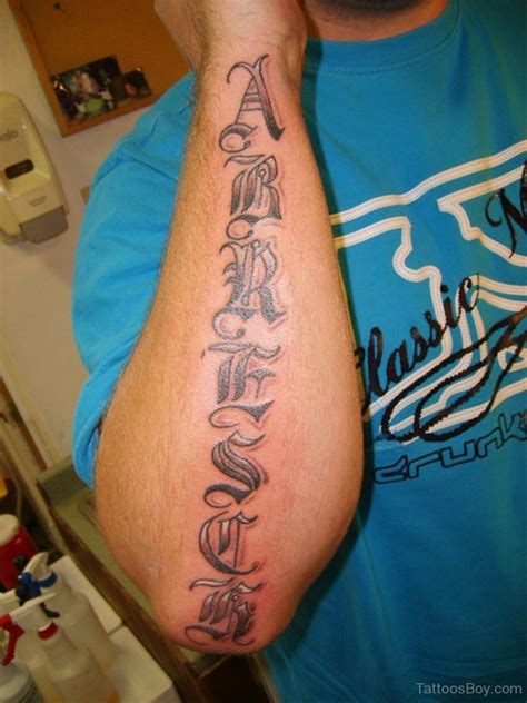 Old English Font Tattoo On Arm