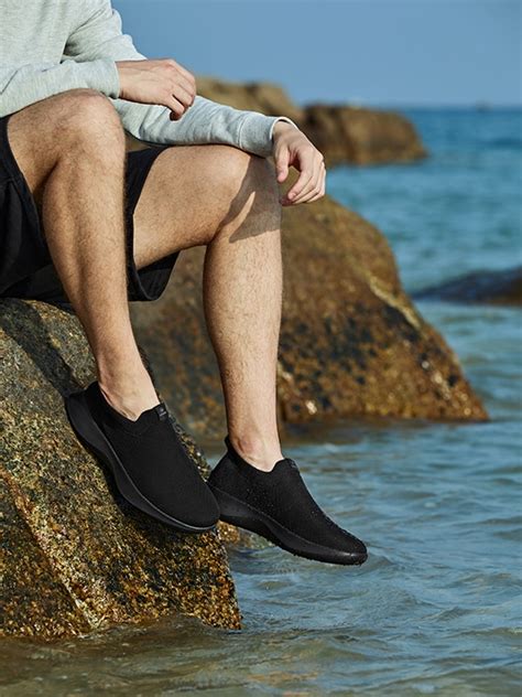 Bernie Waterproof Slip on Sneakers in Solid Black-Men's Shoes | VIVAIA