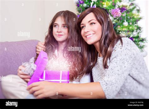 Open Christmas gift Stock Photo - Alamy