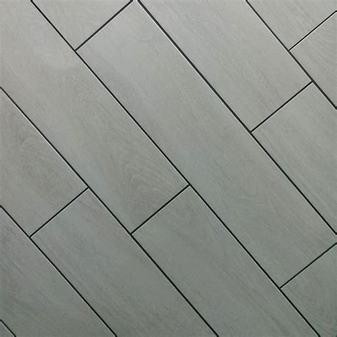 dark grey floor tiles with grey grout - Brunilda Charlton