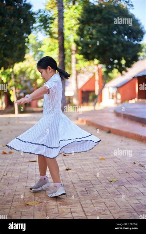 Girl spinning in skirt in hi-res stock photography and images - Alamy