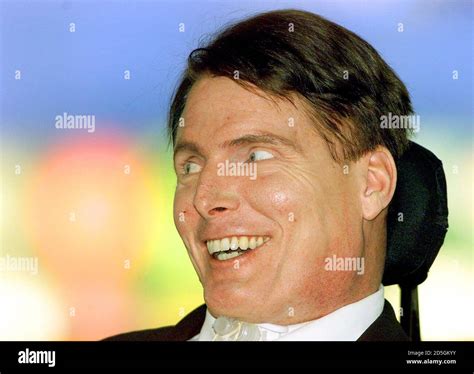 U.S. actor Christopher Reeve smiles during a visit with his family to London's Millennium Dome ...