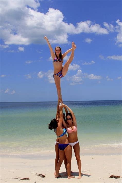 cheering on the beach | Cool cheer stunts, Cheer pictures, Cheer stunts