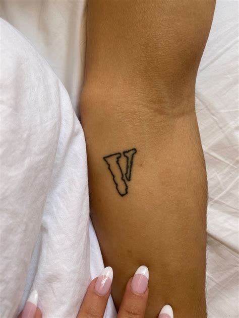 Vlone tattoo / A$AP rocky in 2022 | Pretty tattoos, Tattoos for guys, Asap rocky tattoos