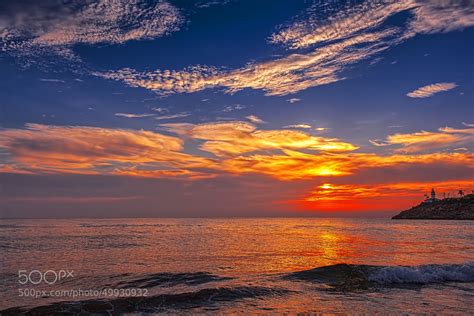 Photograph Sunrise near the lighthouse by efecreata photography on 500px