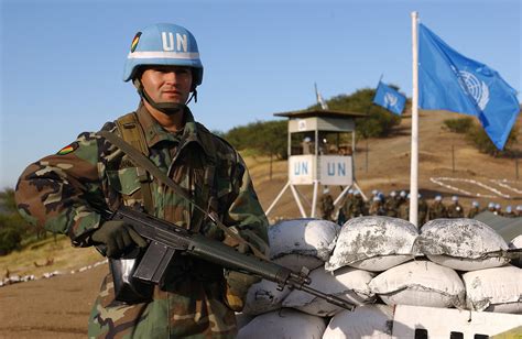 File:Bolivian Army 2nd Lt. Mauricio Vidangos stands guard at the entry control point of an ...