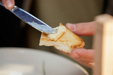 Man Buttering Toast Stock Photos, Pictures & Royalty-Free Images - iStock