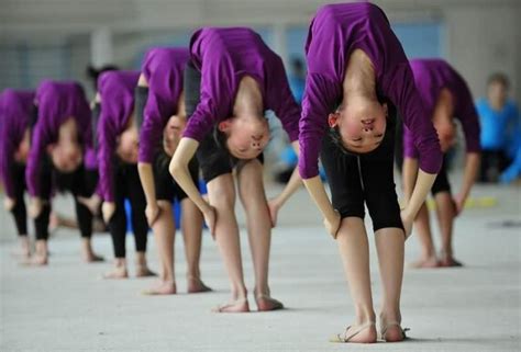 Chinese kids training in Gymnastics Brutal Training Pics - Neeshu.com