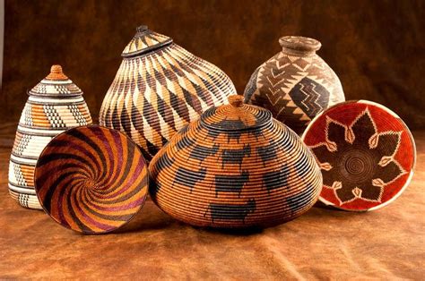 Traditionally woven Zulu Ilala Palm Ukhamba baskets from South Africa group beautifully with ...