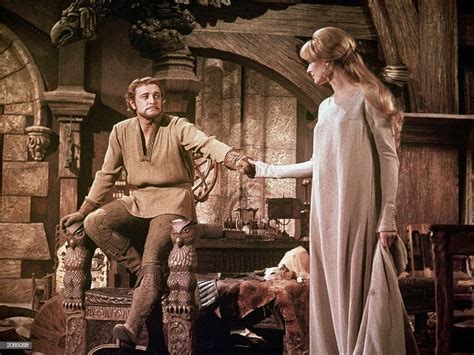 Richard Harris as King Arthur holds the hand of Vanessa Redgrave as Guenevere in a still from ...