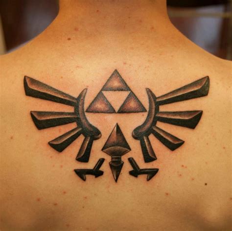 This classic Triforce back tattoo: | Zelda tattoo, Legend of zelda tattoos, Gaming tattoo