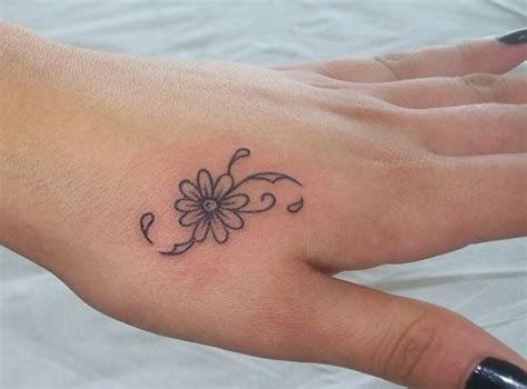 Small Wrist Small Gerbera Daisy Tattoo - Best Tattoo Ideas