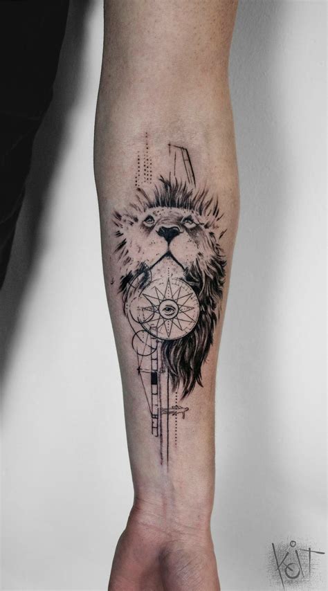 a man's arm with a lion and compass tattoo on the left side of his leg