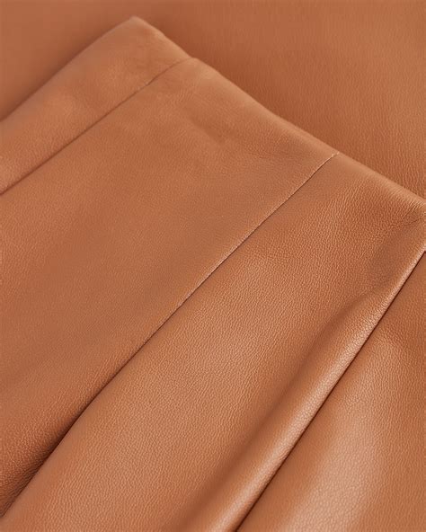 Express | Super High Waisted Faux Leather Mini Skirt in Butterscotch ...