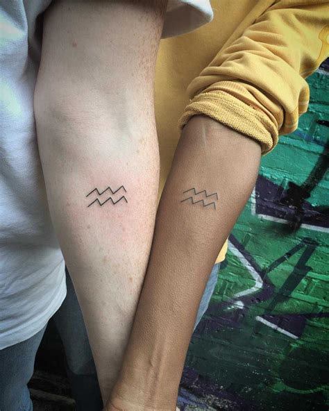 Matching Aquarius sign tattoos by Kirk Budden | Spiritual tattoos ...