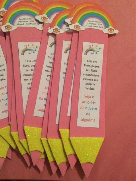 five pink paper bookmarks with rainbows on them and some words written in spanish