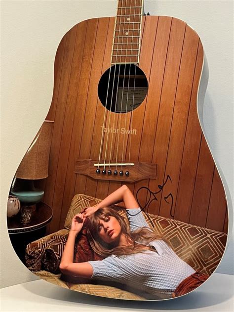 Taylor Swift Gives Signed Guitar to Charity Auction - Tales From The ...