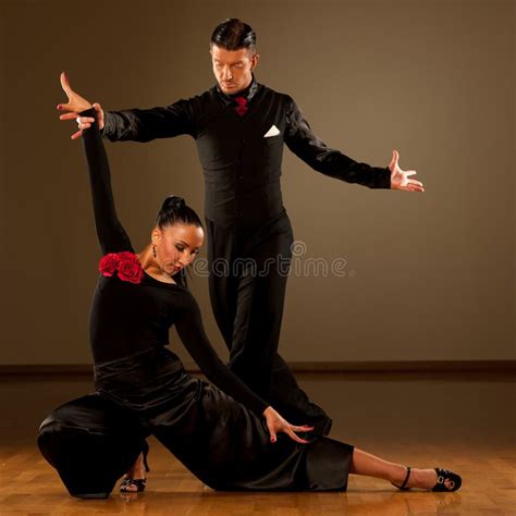 Professional Ballroom Dance Couple Preform an Exhibition Dance Stock ...