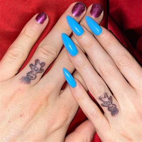 Megan Fox, Machine Gun Kelly Get Matching Tattoos on Ring Fingers | Us ...