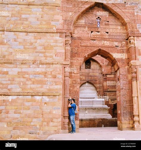 Inside the Qutub Minar Complex with antic ruins and inner square ...