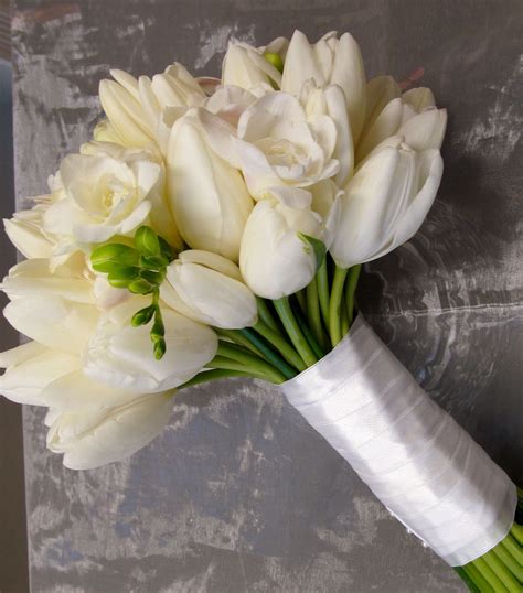 white tulip and freesia bridal bouquet | Freesia bouquet, Wedding bouquets, Freesia wedding bouquet