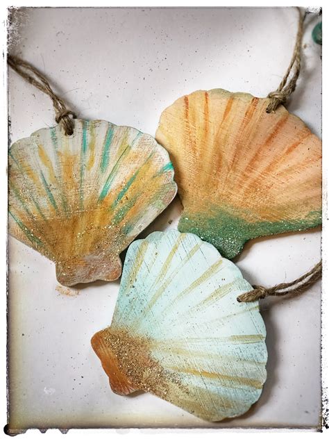 Wooden Scallop Shell ornaments | Shell ornaments, Scallop shells, Ornaments