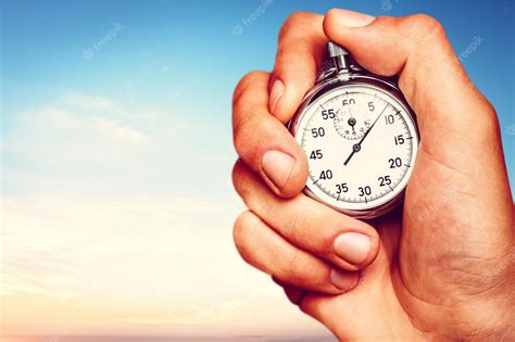 Premium Photo | Close-up stopwatch in human hand, timer