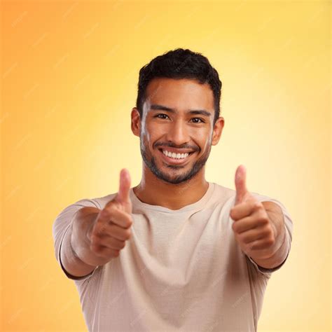Premium Photo | Happy man thumbs up and like emoji portrait with smile and hands for advertising ...