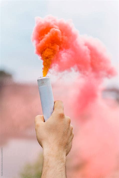 "Pink Smoke Bomb" by Stocksy Contributor "Studio Marmellata" - Stocksy