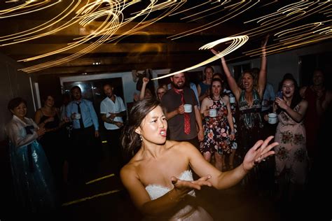 Utah Wedding Photographer: bride dancing, crowd cheering