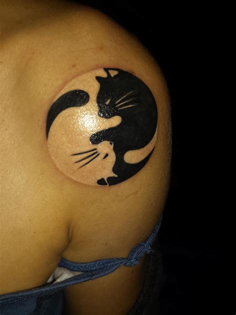 Cat yin yang shoulder tattoo by Stephen at Mighty Mikes, south FL : tattoos