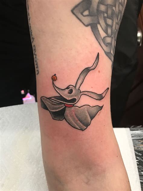 a small tattoo on the leg of a person