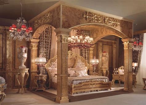 an elaborately decorated bedroom with chandelier and bed in the middle ...