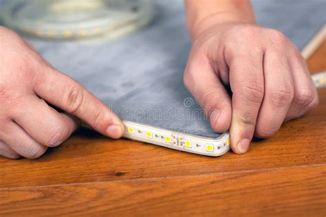 Worker Installs Strip LED Lighting. Installation of Decorative Diode Tapen Stock Photo - Image ...