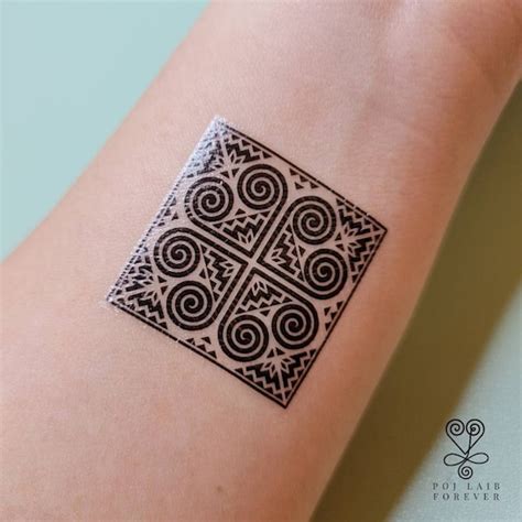 Share 54+ hmong design tattoo super hot - in.eteachers