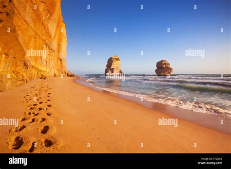 Footsteps on the beach at the Twelve Apostles along the Great Ocean ...