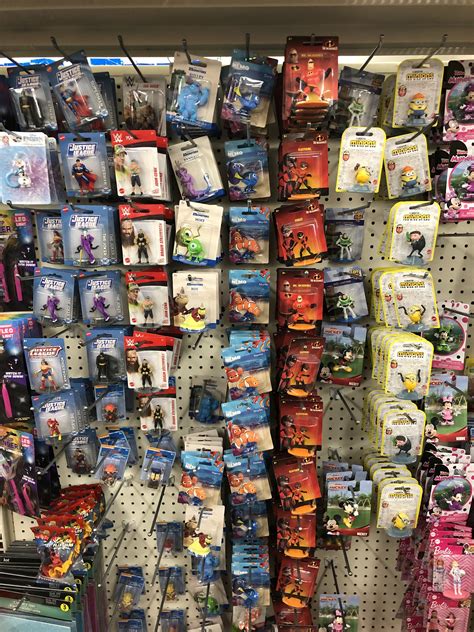 The Dollar Tree has a lot of our team's characters figurines for sale ($1 each) : r/disneyarena