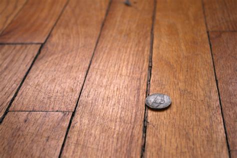 3 Ways to Fill Gaps Between Wood Floorboards | Old wood floors, Refinishing hardwood floors ...