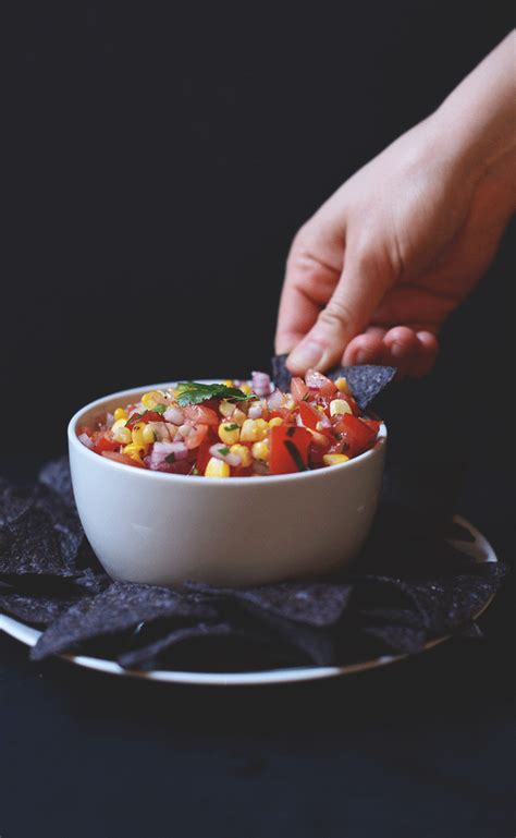 Grilled corn salsa with perfectly grilled corn, fresh tomato, red onion, and cilantro, a little ...