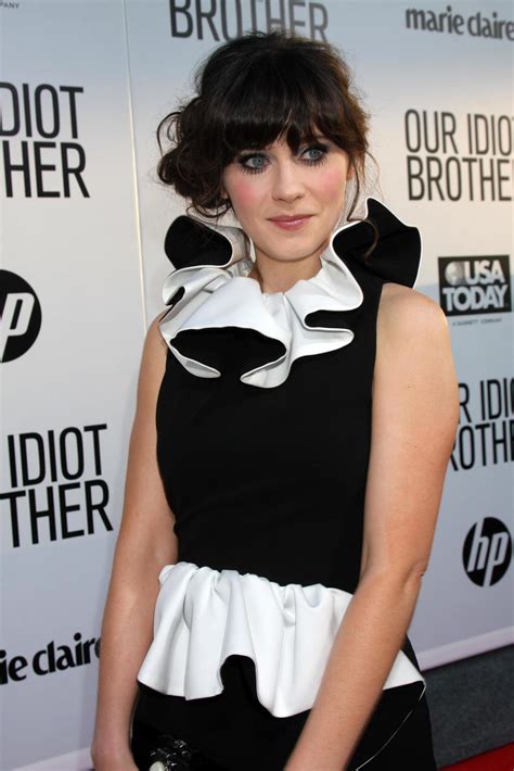 LOS ANGELES, AUG 16 - Zooey Deschanel arriving at the Our Idiot Brother Premiere at Cinerama ...