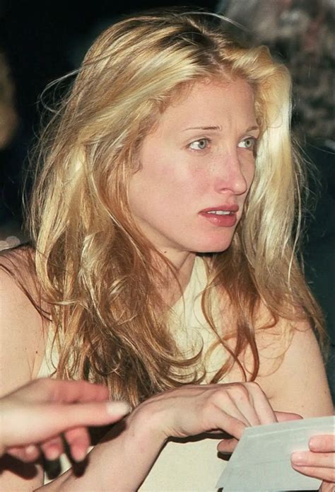 Carolyn Bessette Kennedy attending the presentation of the new watch Cartier « Tank » in Geneva ...