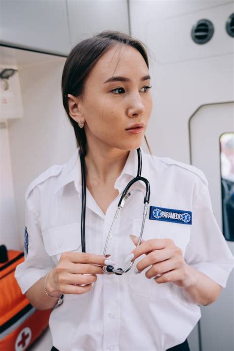 A Paramedic Inside an Ambulance · Free Stock Photo