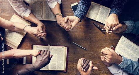 Group of people holding hands praying worship believe Stock Photo | Adobe Stock
